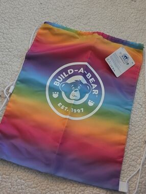 Build-A-Bear Rainbow Gradient Drawstring Bag with White Logo
